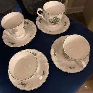 Noritake set of four tea cups with saucers mint condition.